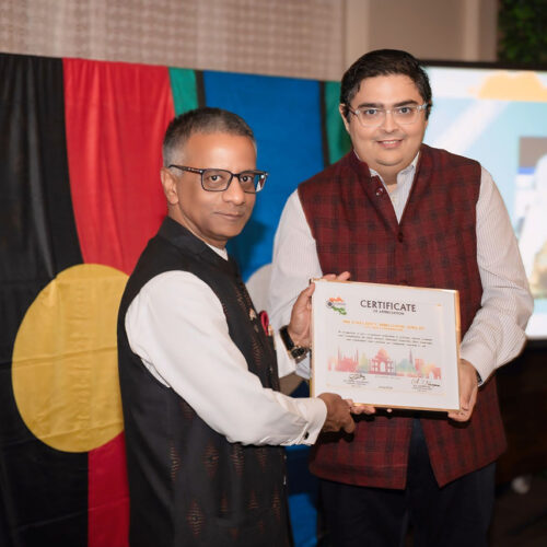 Dr Abhishek Joshi Presenting Certificate to High Commissioner